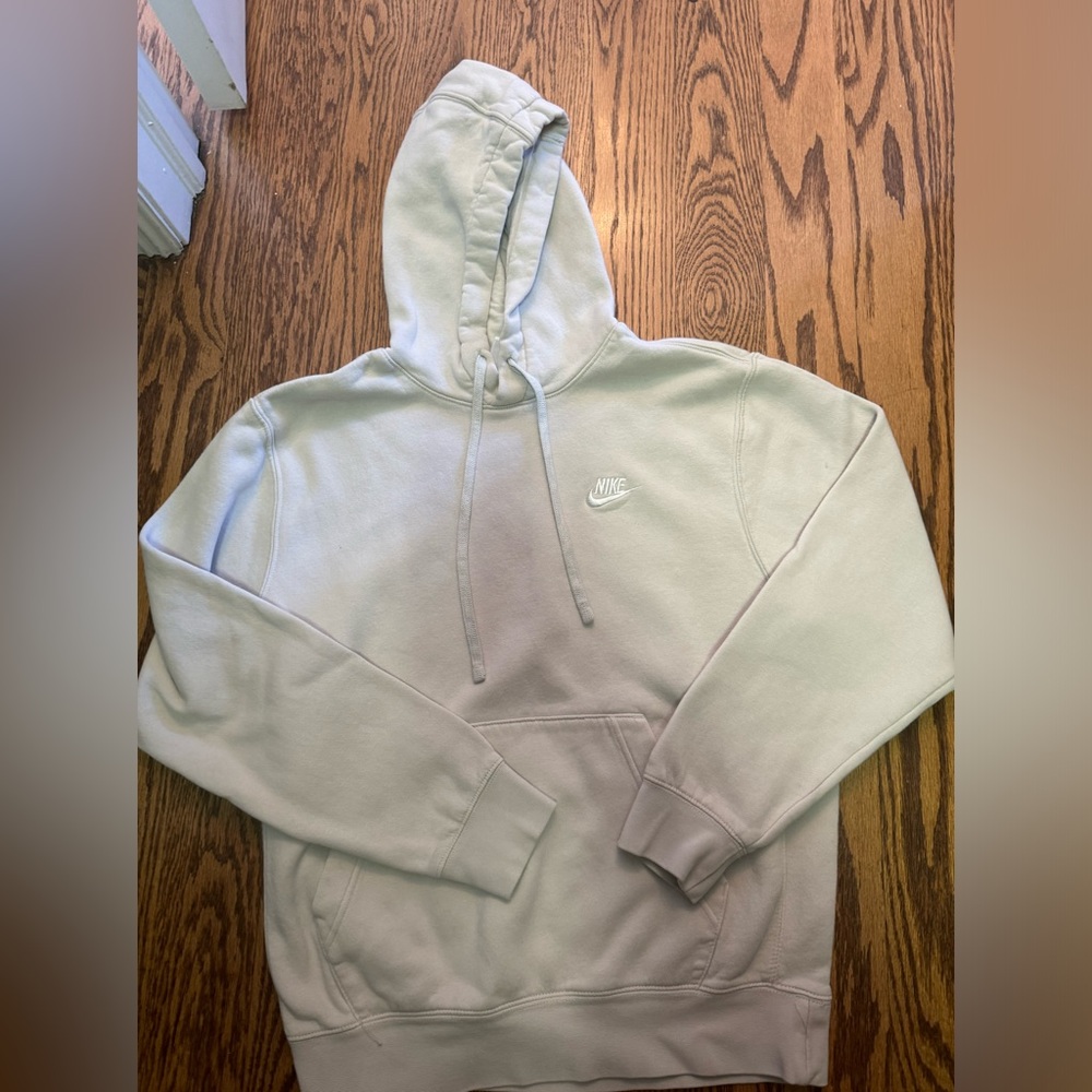 Cream colored Nike hoodie